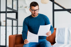 A man checking bank statement,