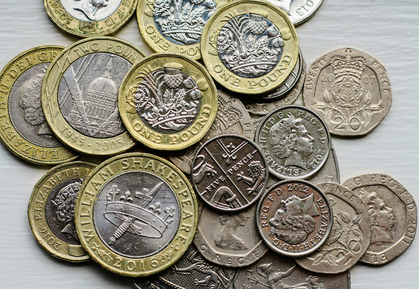 Pile of British coins on a table