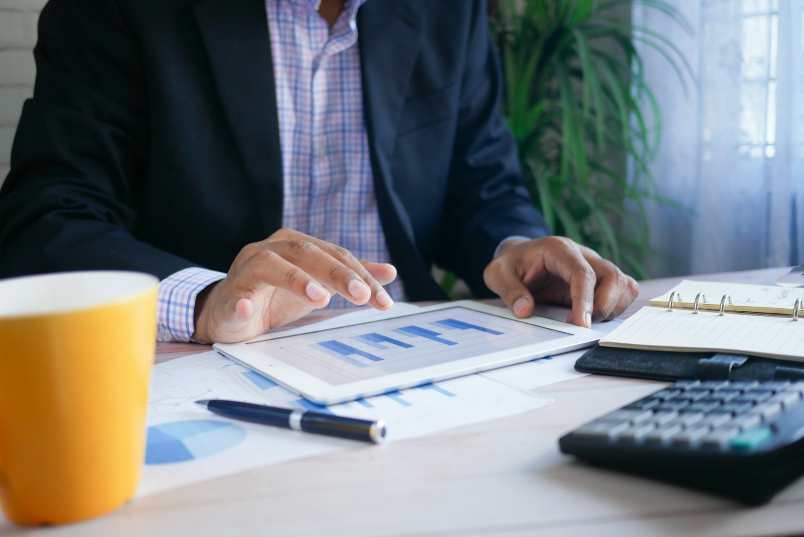 Adviser in a suit reviewing a document