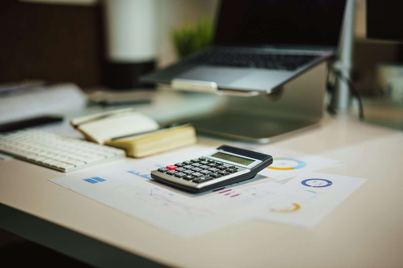 Calculator and paperwork on a desk