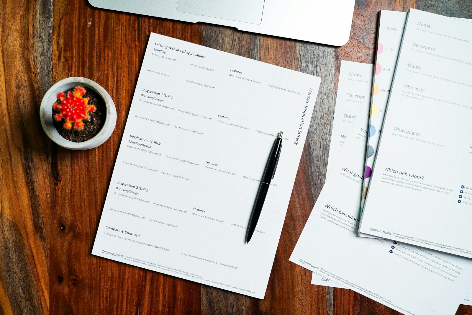 Pension paperwork on a desk with a pen